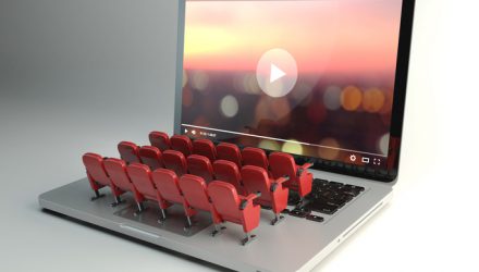 Video player app  or home cinema concept. Laptop and rows of cinema seats, 3d illustration